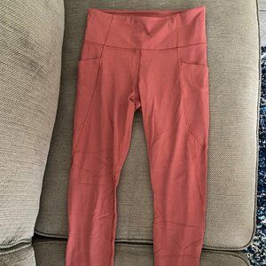 Athleta Stash Pocket Salutation Tight